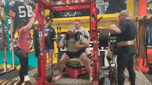 GIF of a powerlifter squatting with the Marrs-Bar