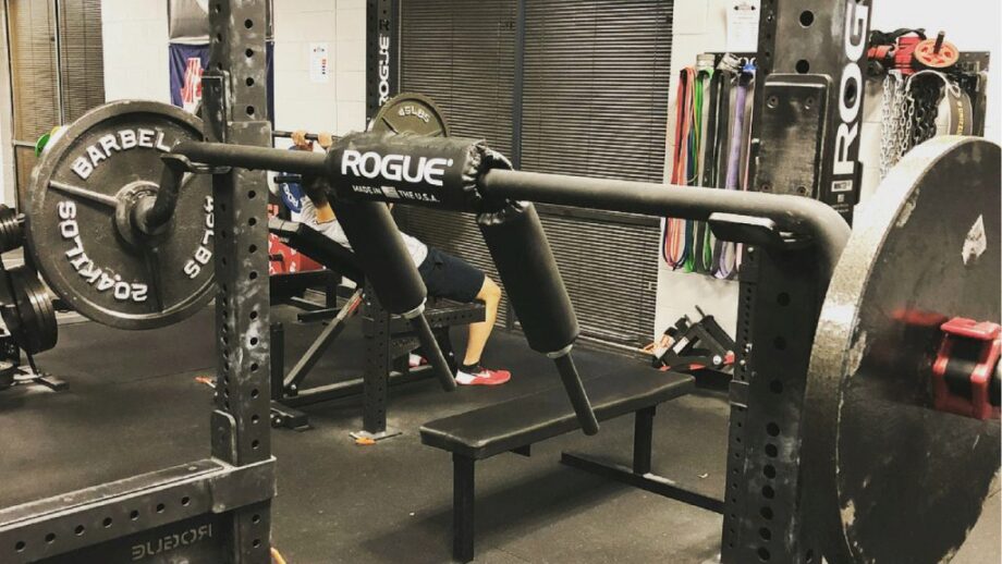 The Rogue SB-1 Safety Squat Bar in a squat rack