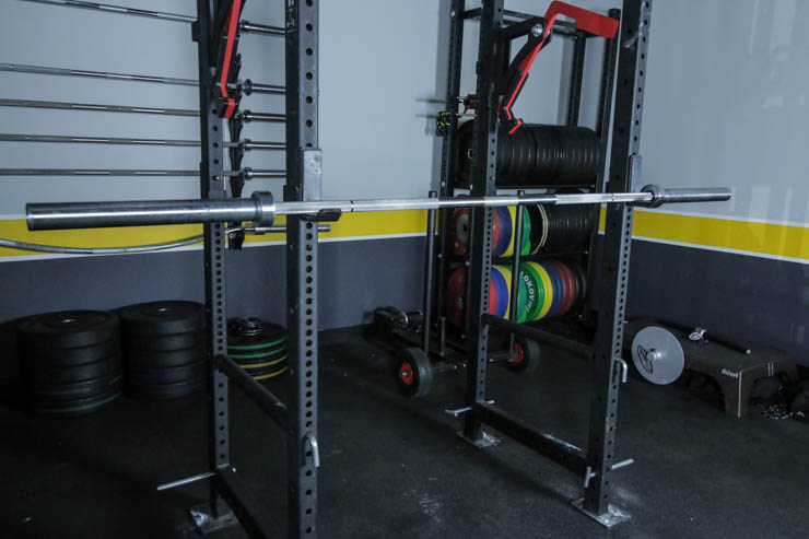 american Barbell Stainless Bearing Bar on a squat rack