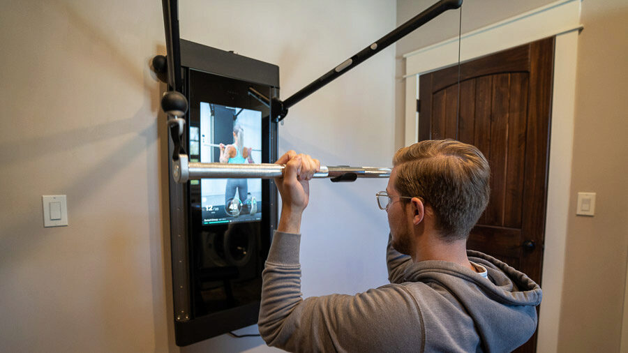 barbell pulldowns on the Tonal Smart Home Gym