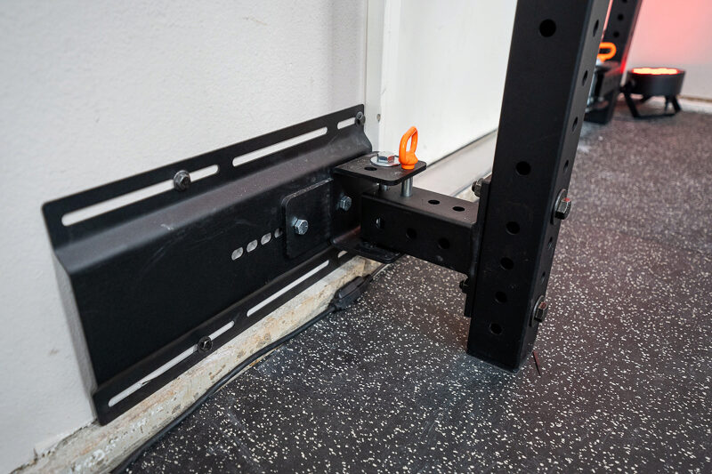 Rogue Fitness RML-90SLIM Rack bolted to the wall in a garage gym