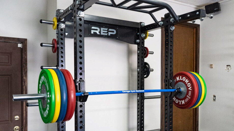 Rep Fitness HR-5000 Half Rack with barbell and weighted plates