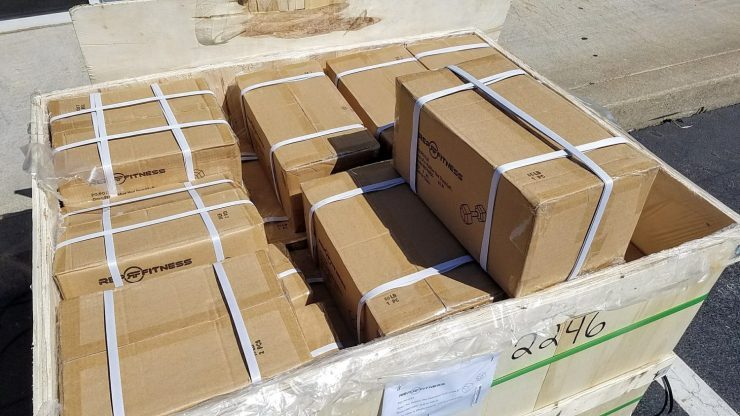 Up close picture of the giant crate the dumbbells came in.