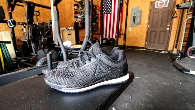 Reebok JJ 2 Training Shoes in a garage gym