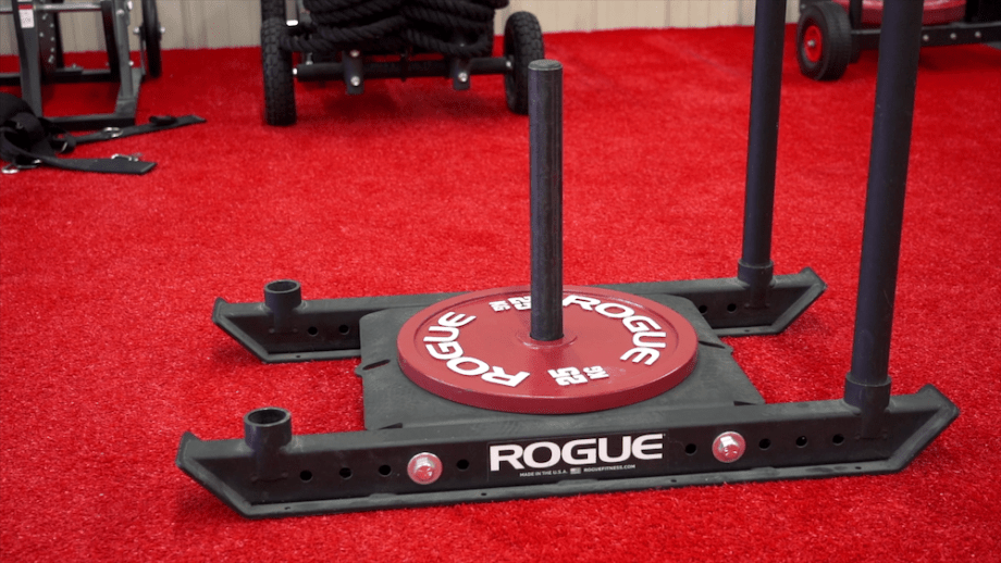 Rogue Dog Sled with a red weight plate.