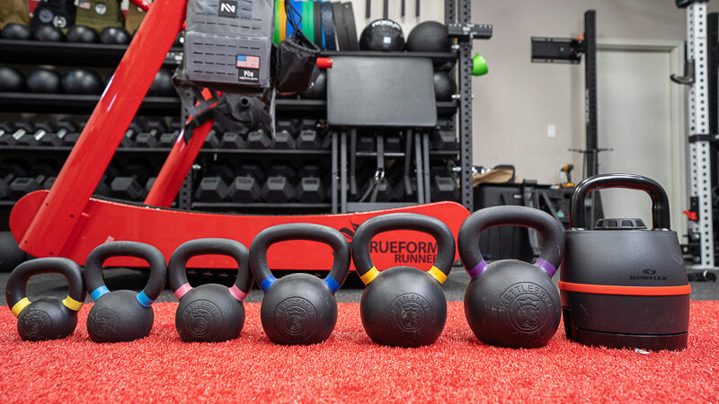 Showing how many kettlebells you would need to equal one of the adjustable kettlebells from Bowflex. 