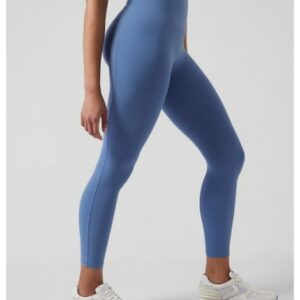 athleta salutation stash 7/8 tight blue product photo side view pocket