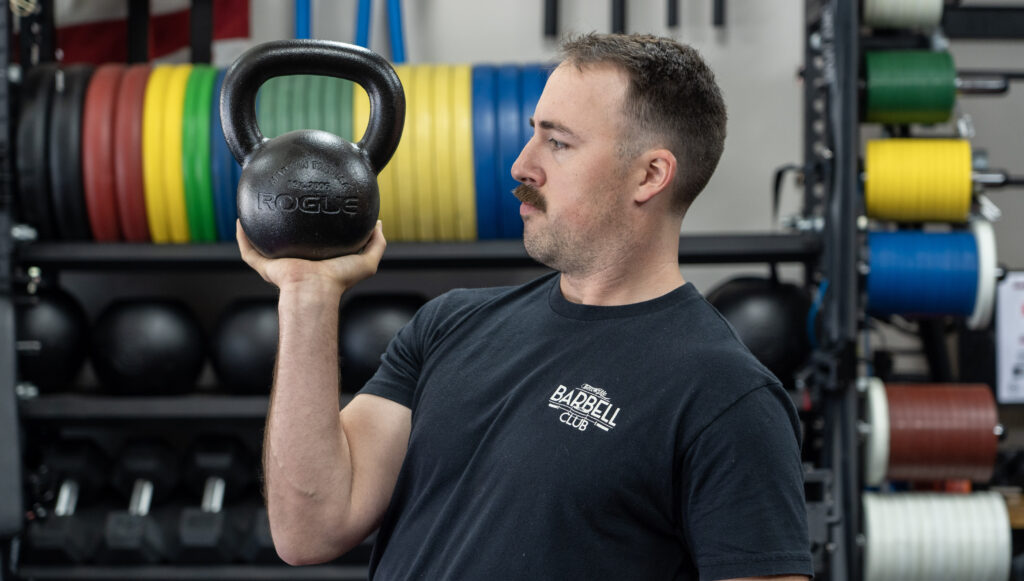 Man holding kettlebell