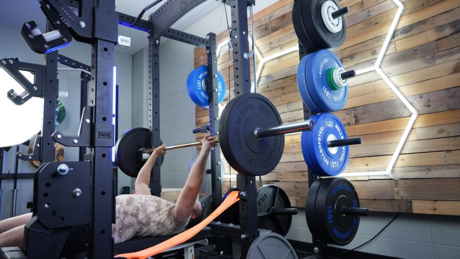 Bells of Steel matte black bumper plate on barbell