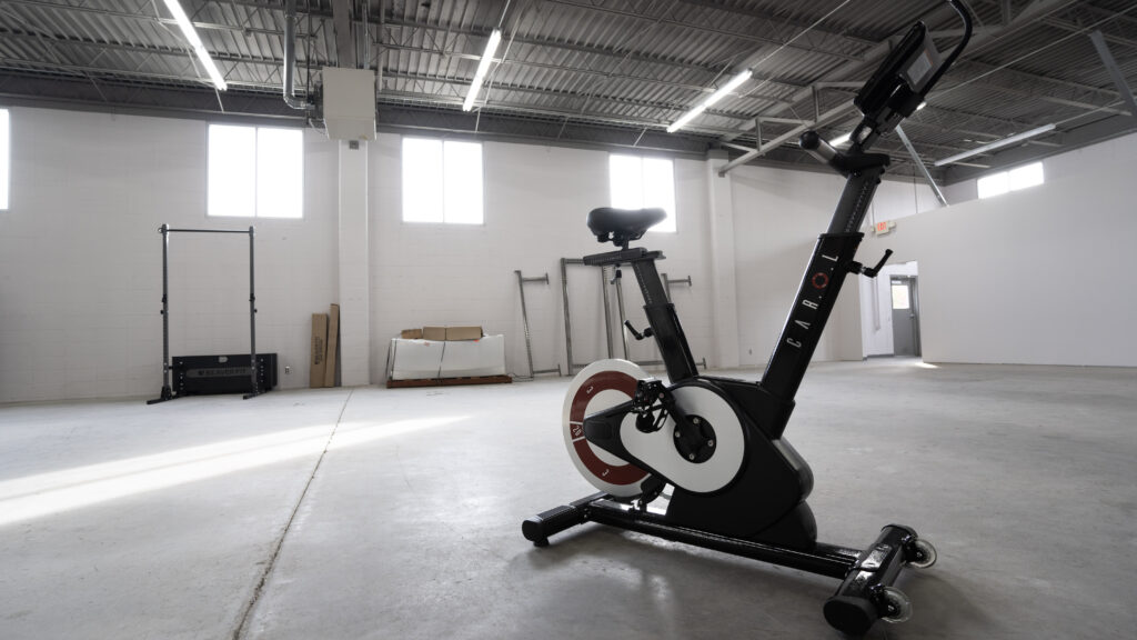 CAROL Bike standing alone in the gym.