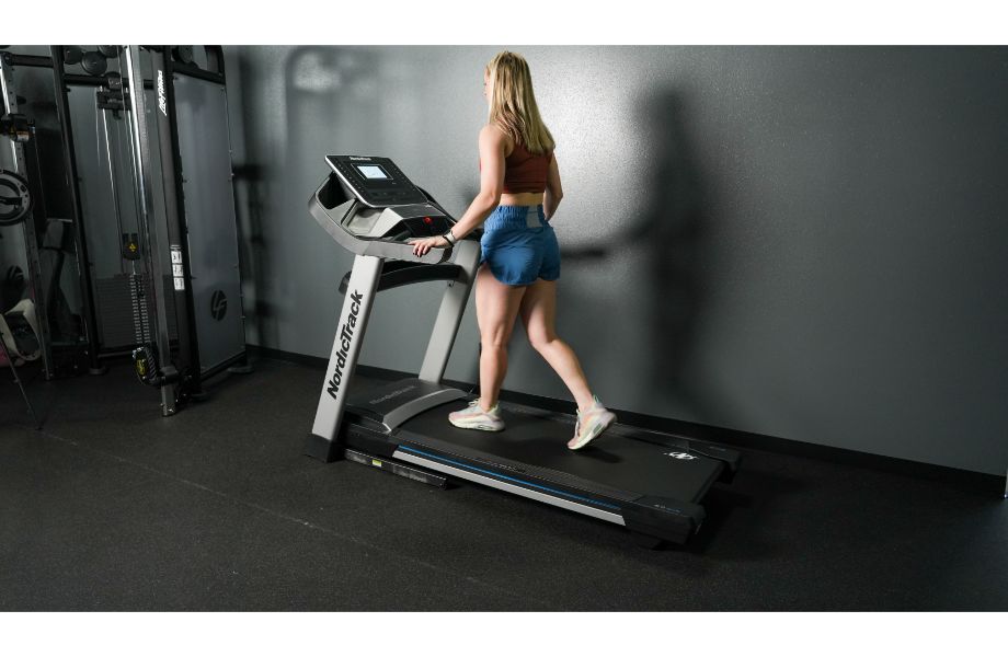 Caroline walking on NordicTrack EXP 7i Treadmill