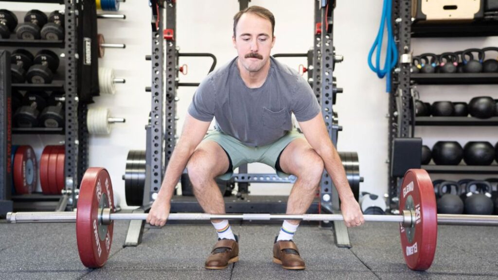 coop performing a deadlift with the NOBULL Lifter Shoes