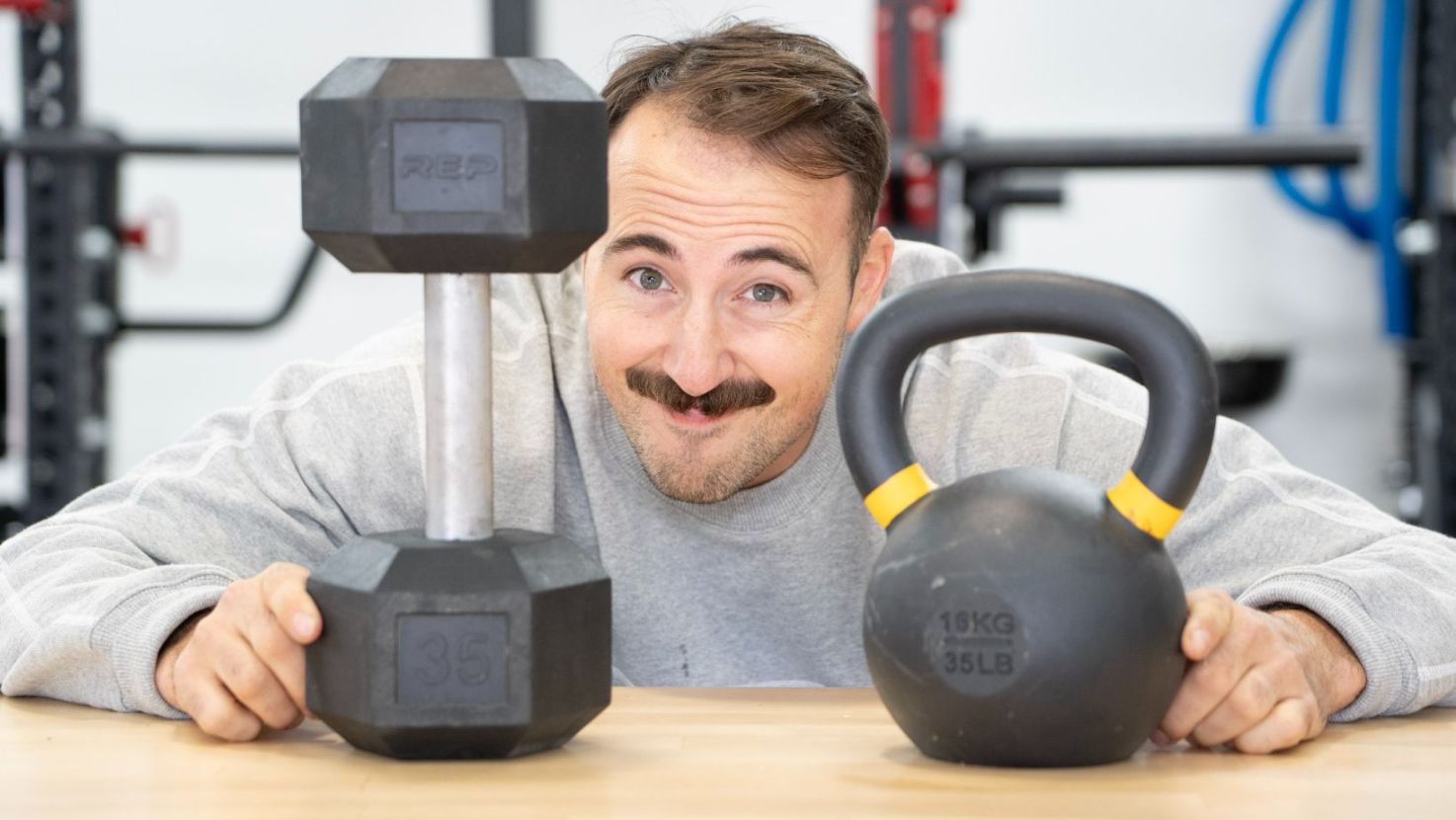 Dumbbells vs. Kettlebells: The Battle for Free Weight Supremacy Cover Image