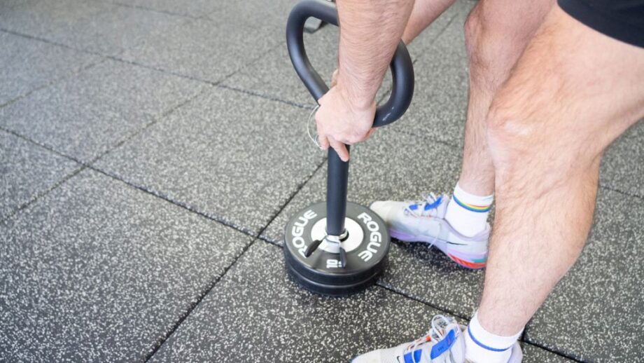 Coop using Titan loadable kettlebell 