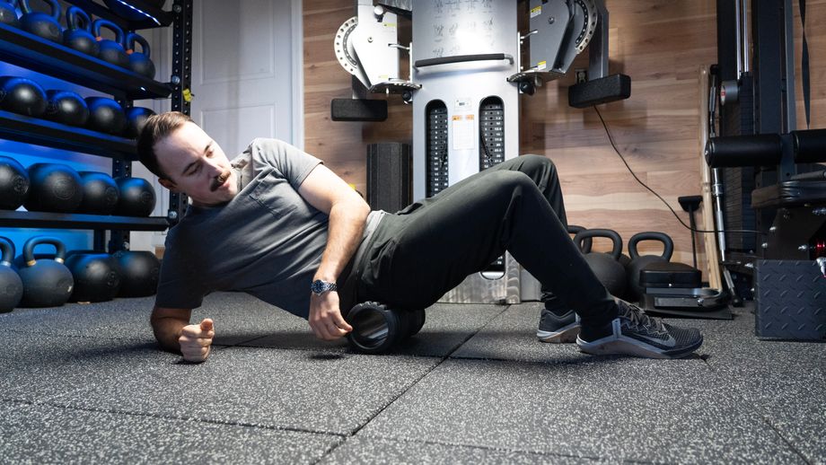 Coop in a gym using a foam roller