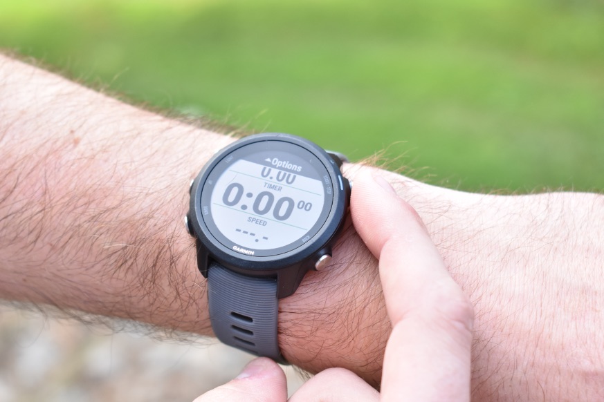 an image of the garmin forerunner 245 fitness tracker watch on a man's wrist