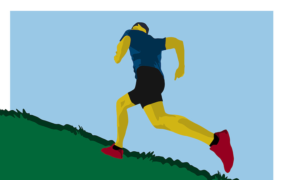 An image of a man running uphill