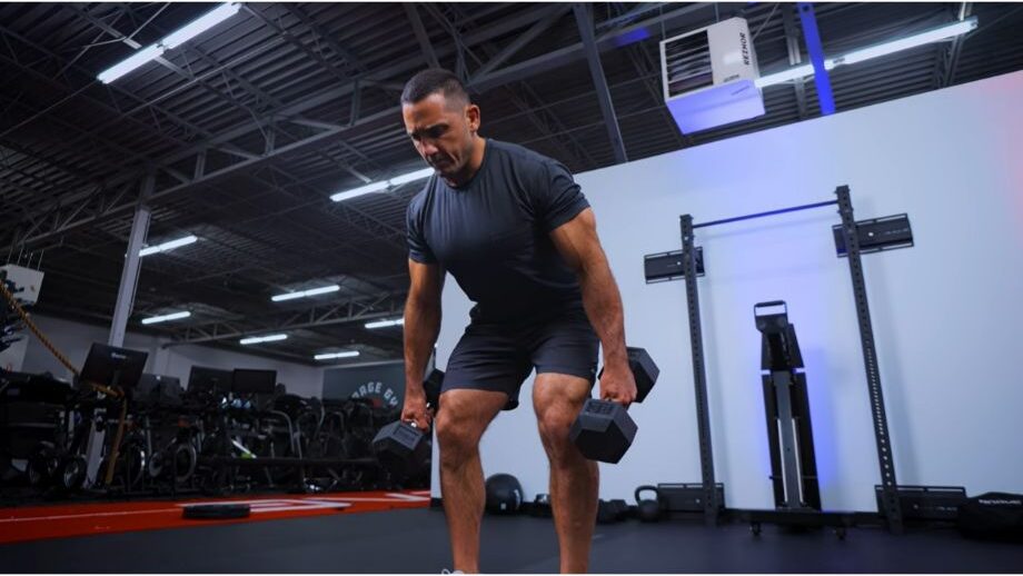 Jason Khalipa using dumbells