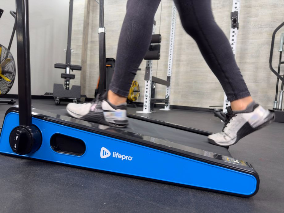 Photo of someone walking on the LifePro PacerMini treadmill