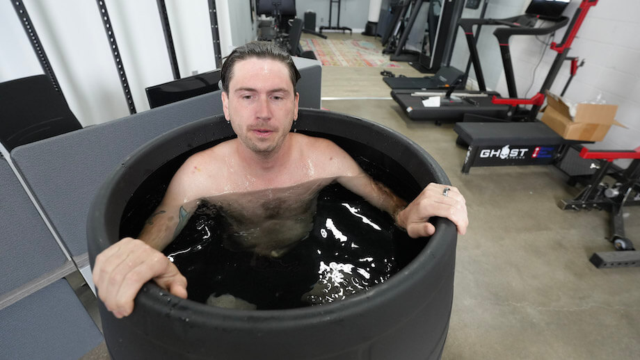 Man after ice bath in ice barrel