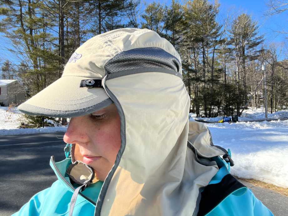 Woman wearing Outdoor Research sun running UV protection hat