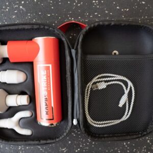 REP Fitness Massage gun in its carrying case with attachments