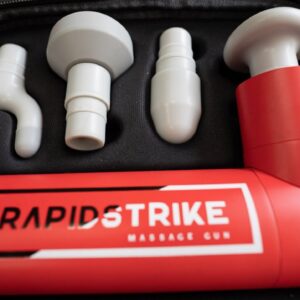Closeup of the REP Rapidstrike massage gun in its carrying case with the four attachment heads