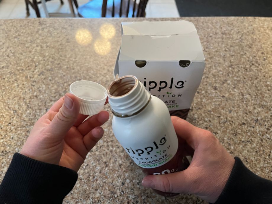 Opening a Ripple Protein shake bottle