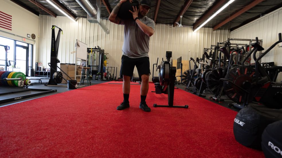 Mike using the Rogue Strongman Sandbags