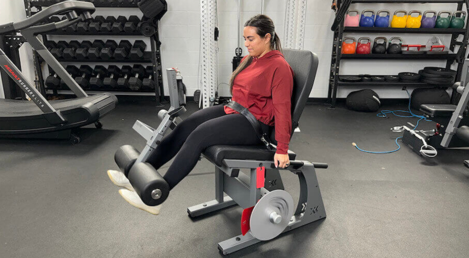 Seated Leg Extension: Machine Guide, Alternatives & More