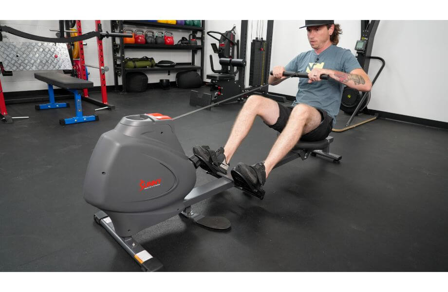 Sunny Health & Fitness SPM Magnetic Rowing Machine being used