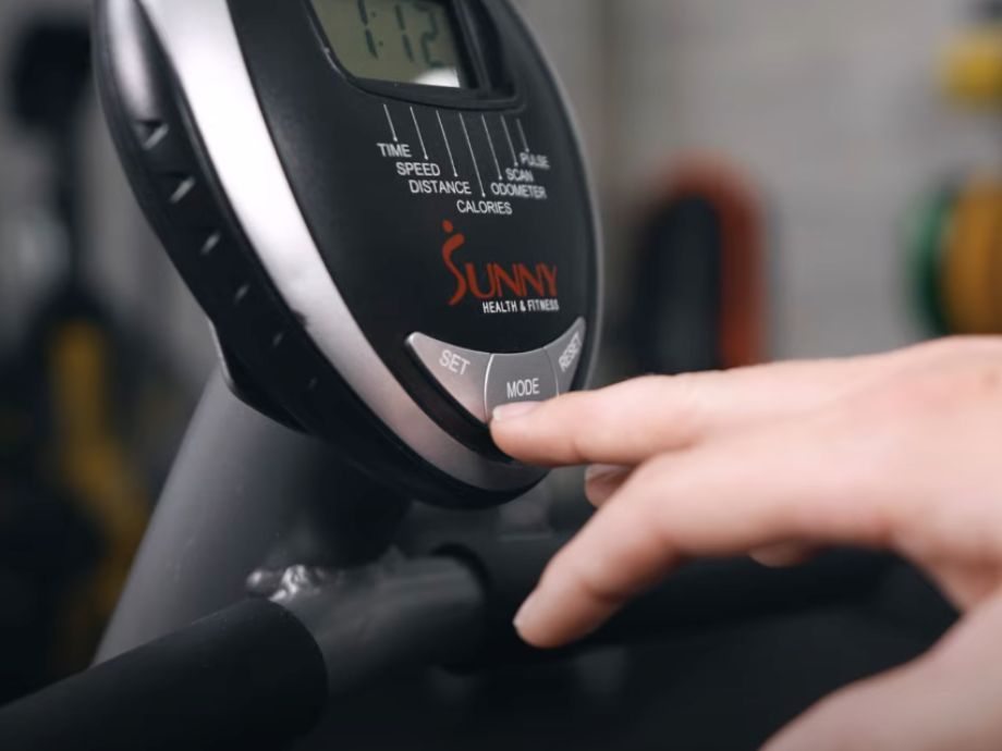 A close up view of the monitor on the Sunny Health and Fitness Essential Recumbent Bike.