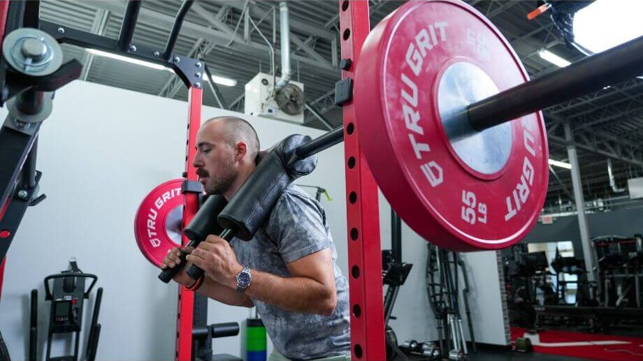 Titan Series Safety Squat Bar in use