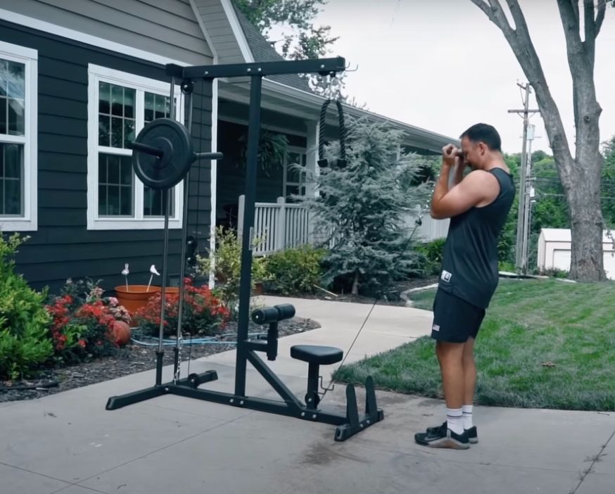 coop using the Titan Plate Loaded Lat Pulldown outdoors