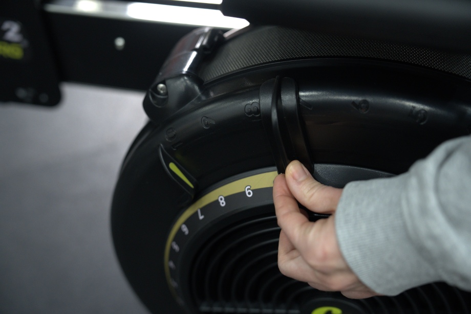 A close look at the flywheel cover and resistance adustment on a Concept 2 Strength ERG