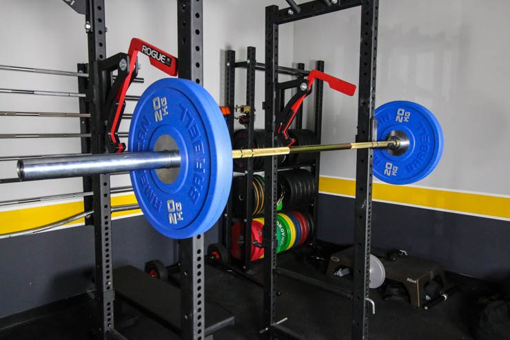 American Barbell Gold Standard Bar on a squat rack