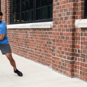 Athlete using the AbMat medicine ball for wall slams