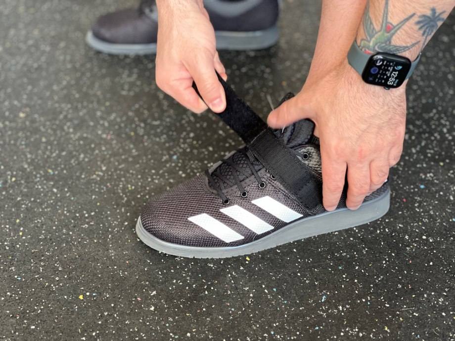 Out tester straps in to the adidas Powerlift 5 shoes.