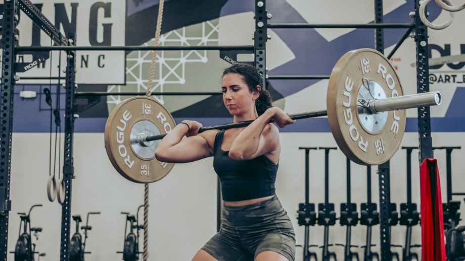 Amanda catching a barbell in the front-rack position