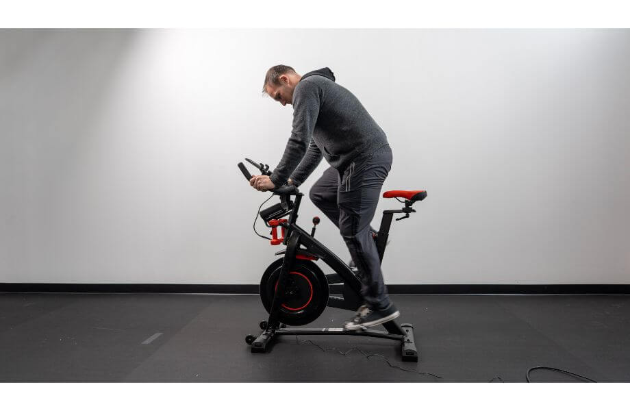 anthony pedaling on bowflex c6