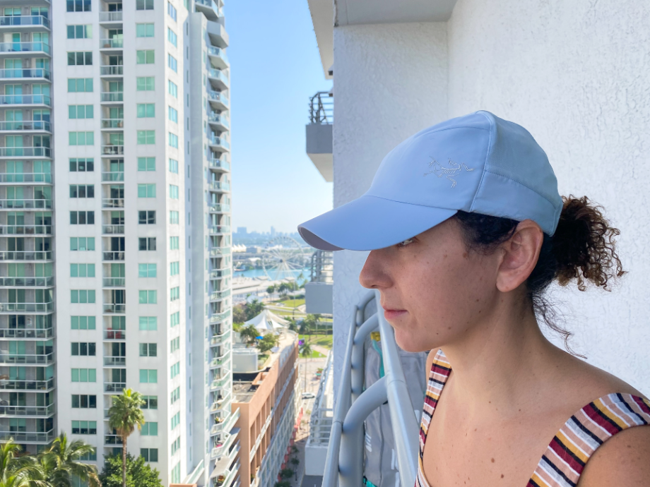 Woman wearing baby blue Arcteryx running hat