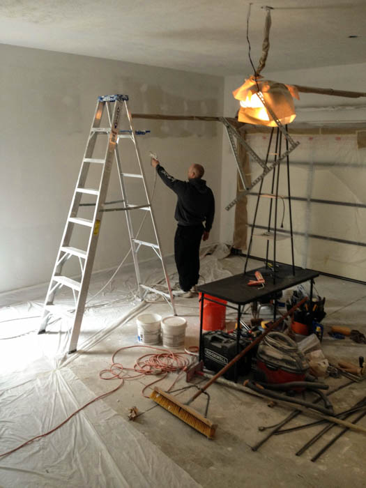 man building a garage gym