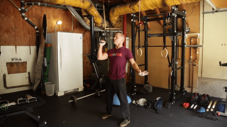 Tim Ferriss using a kettlebell