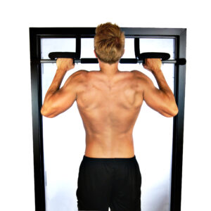 Back view of shirtless man in black shorts doing pull ups on Stamina Doorway Trainer Plus.