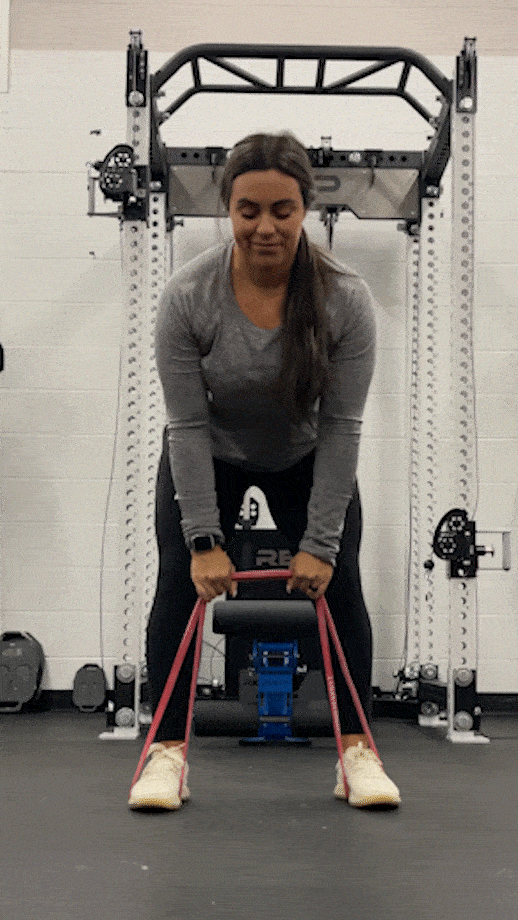 woman doing banded bent over row