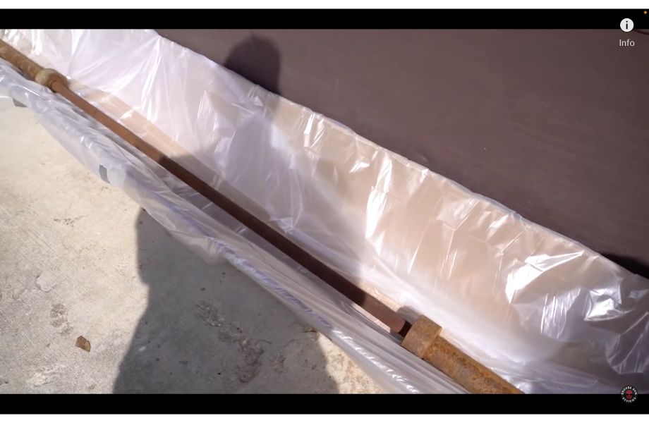 Barbell sitting in cardboard box