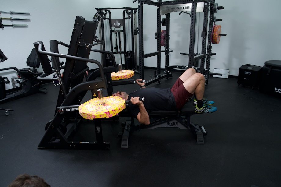 Coop gets ready to try a bench press on the Bells of Steel Dreadmill.