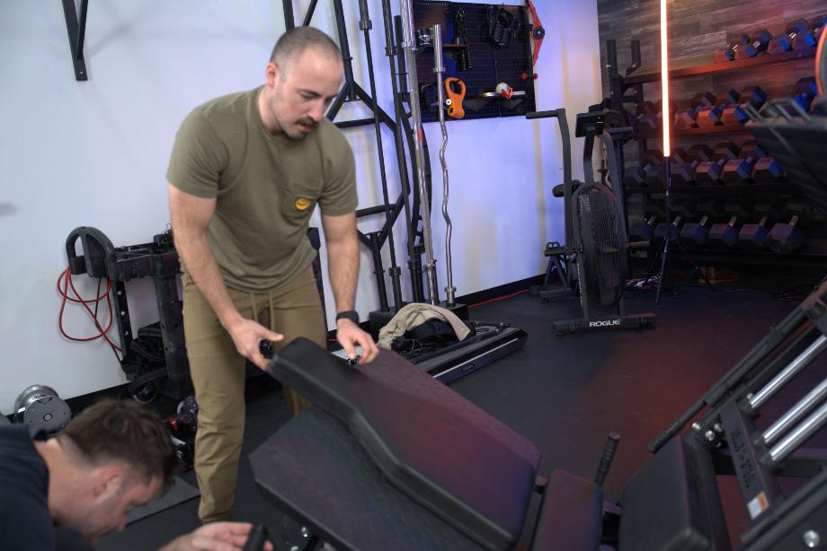 Adjusting the back pad on a Bells of Steel Iso Leg Press and Hack Squat Machine.