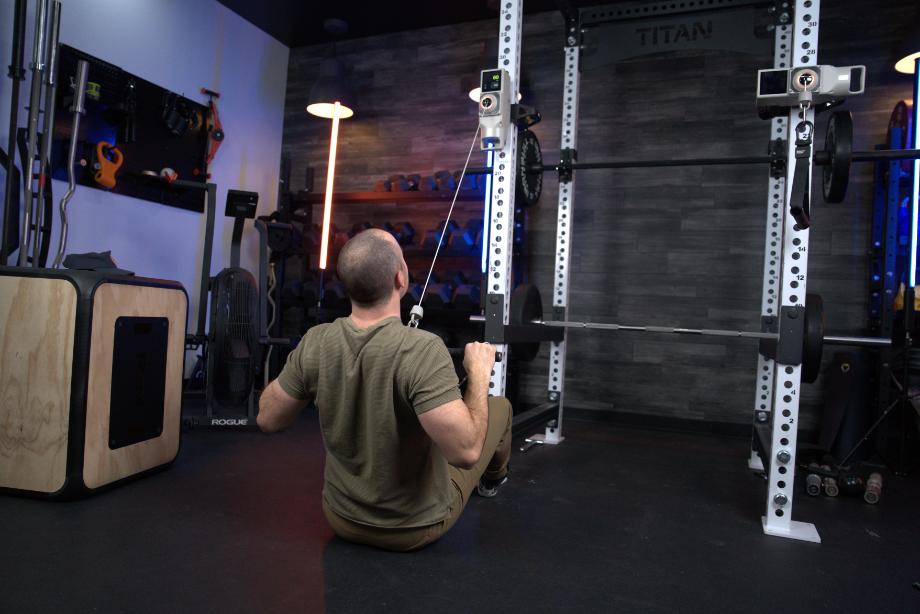 Man using the Beyond Power Voltra I for lat pulldowns