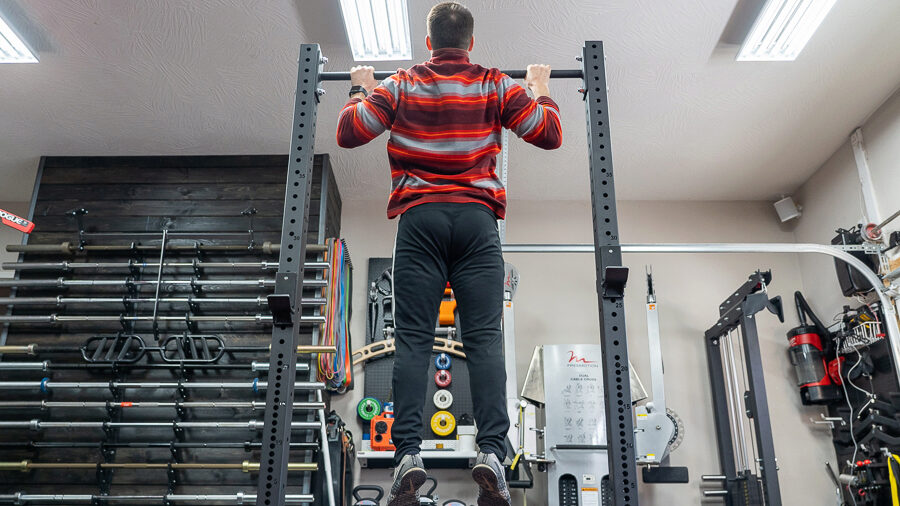 coop doing a pull up on the REP SR-4000 Squat Rack